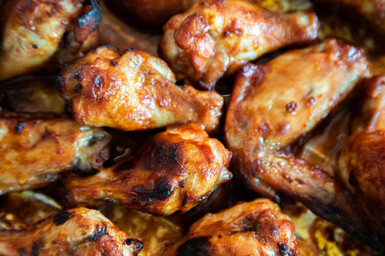 Close up image Grilled chicken wings and legs on  table, Top view.