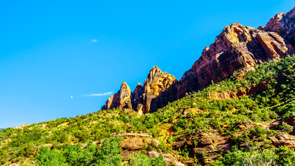 Sunset over the rugged sandstone mountains in Zion National Park in Utah, United States. Viewed from the first hairpin curve in the Zion-Mount Carmel Highway