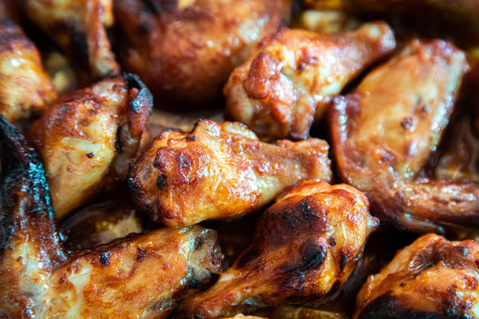 Close up image Grilled chicken wings and legs on  table, Top view.