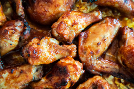 Close up image Grilled chicken wings and legs on  table, Top view.