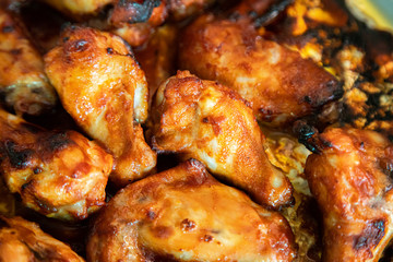 Close up image Grilled chicken wings and legs on  table, Top view.