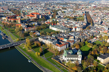 Obraz premium Aerial balloon view of the city, Wawel Royal Castle, Skalka Monastery, Vistula River and Grunwald Bridge, Krakow, Poland