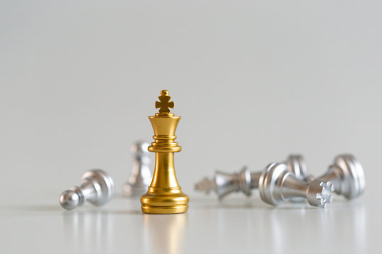 Premium Photo  The silver king chess piece standing in front of