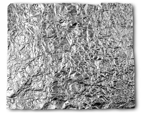 Silver Leaf Foil Background with Shiny Crumpled Uneven Surface for