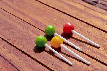 lollipop candy on wooden table