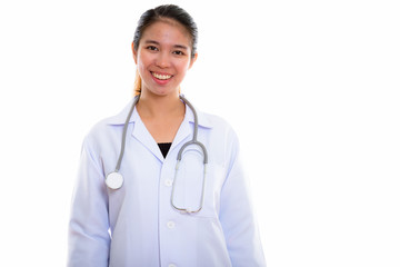 Portrait of young Asian woman doctor against white background