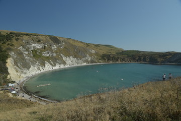 View over Lulworth Cove rock formations and strata on the Dorset coast