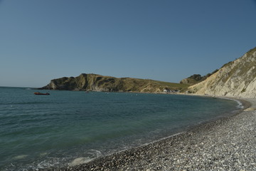 View over Lulworth Cove rock formations and strata on the Dorset coast