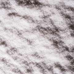 Texture and background of night snow. Top view. Winter. Copy space. Instagram style