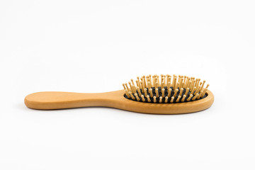 Wooden hair brush isolated on white background,wood comb for hair care