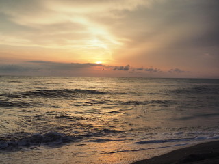 Obraz premium picturesque Pink sunset on lake beach sea sand beautiful colors in the sky clouds