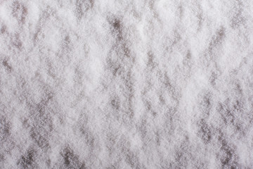 Texture and background of night snow. Top view. Winter. Copy space