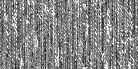 Wool or cotton knit with vertical, horizontal stripes. Thick fabric in black and white thread. Blanket texture. Coverlet. Upholstery. Shawl.