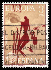 Stamp printed in the Spain with Woman Gathering Honey Mesolithic Rock Painting from Arana Cave Spain circa 1975