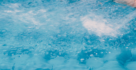Fototapeta na wymiar A blue rubber pool for children to play