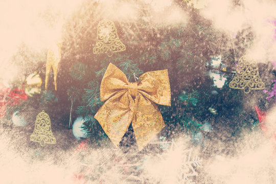 golden bow on christmas tree