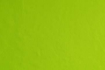 Abstraction background. Green fabric texture sports t-shirts.
