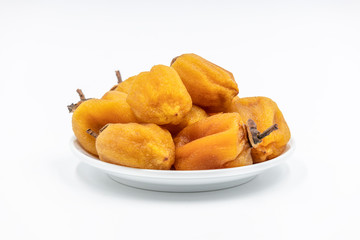 Dry hoshigaki persimmon on white