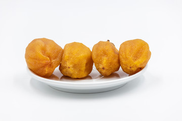 Dry hoshigaki persimmon on white