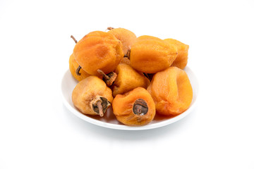 Dry hoshigaki persimmon on white