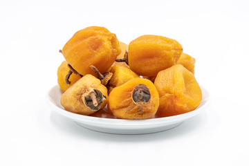 Dry hoshigaki persimmon on white