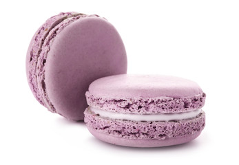 Tasty macarons on white background