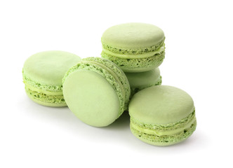 Tasty macarons on white background