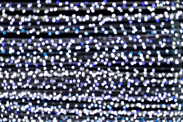 White blue bokeh lights of Christmas lights and New year