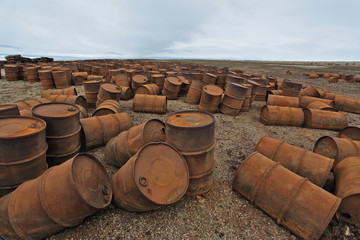 Rusty fuel and chemical drums in the Arctic