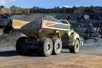 bump truck full of stone at a quarry