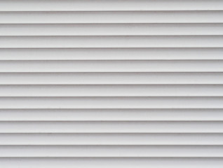 Background of horizontal white metal stripes
