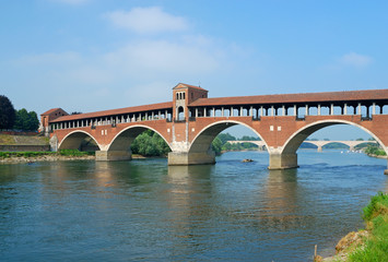 Fototapeta na wymiar the old covered bridge on Ticino river, , Pavia, Italy