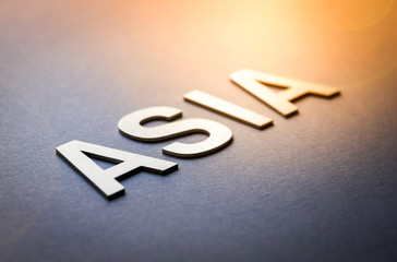 Word Asia written with white solid letters