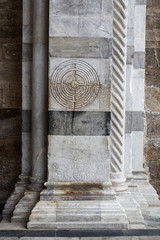 Column of Duomo di San Martino (St Martin Cathedral) in Lucca, Italy. - obrazy, fototapety, plakaty