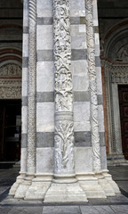 Fototapeta na wymiar Column of Duomo di San Martino (St Martin Cathedral) in Lucca, Italy.