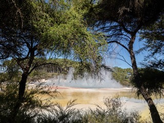 The Champagne Pools in Rotorua spew out hot smoke.This is a popular tourist destination