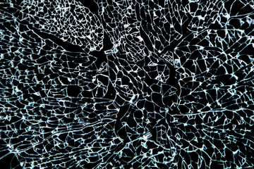 Close-up of Broken Glass, Shattered Tempered glass on Black Background