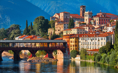 Bridge Ponte degli Alpini at river Brenta Bassano del grappa Italy. Panoramic view at old town with...