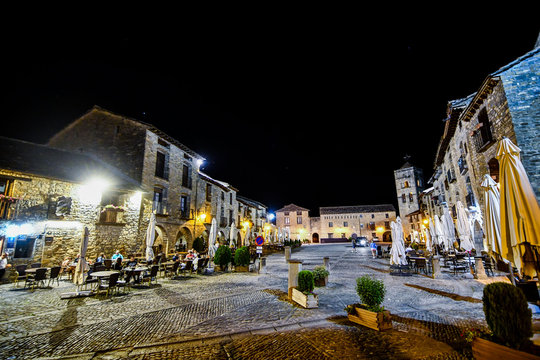 city at night, photo as a background , in ainsa sobrarbe , huesca aragon province