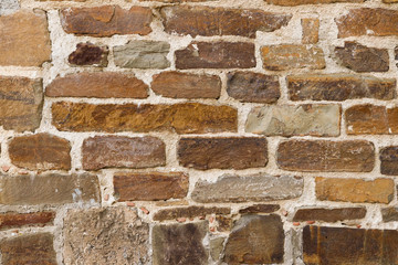 Texture of a antique stone wall. Old castle stone wall texture background. Stone wall as a background or texture.