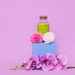 Fototapeta na wymiar Salt spa and flower arrangement. Aroma beauty concept