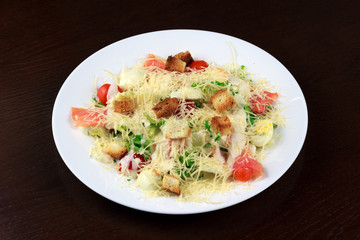 salmon and vegetable salad with parnisan	