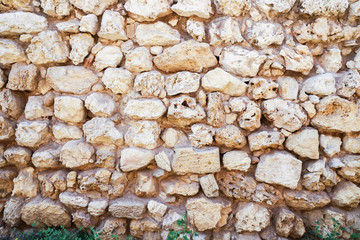 Texture of a antique stone wall. Old castle stone wall texture background. Stone wall as a background or texture.
