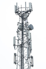 Detailed view of a newly installed 4G and Microwave communications tower. Showing the various antennas and omnidirectional network and phone systems.