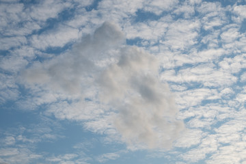 Naklejka na ściany i meble Sky with clouds. Background of blue sky with clouds. Fluffy clouds on a blue sky.