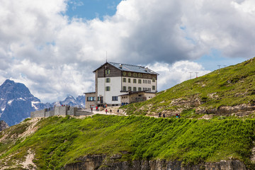 Fototapeta premium Dolomites, Italy - July, 2019: Amazing panoramic view from Tre Cime over the Dolomite's mountain chain