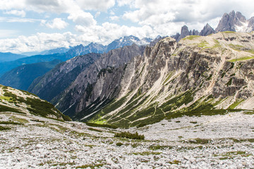 Dolomites, Italy - July, 2019: Amazing panoramic view from Tre Cime over the Dolomite's mountain chain
