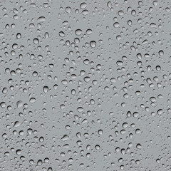  Seamless texture of rain drops on clear glass.