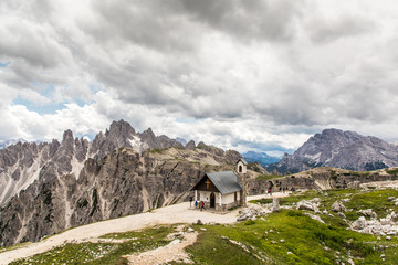Fototapeta na wymiar Dolomites, Italy - July, 2019: Mountains trails to Tre Cime di Lavaredo Dolomites