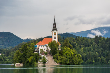 Bled, Slovenia - July, 2019: Lake Bled with St. Marys Church of Assumption on small island....
